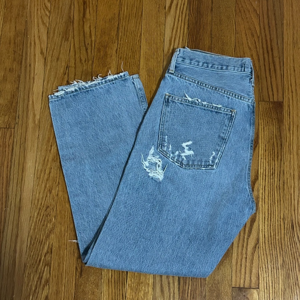 agolde ripped blue jeans